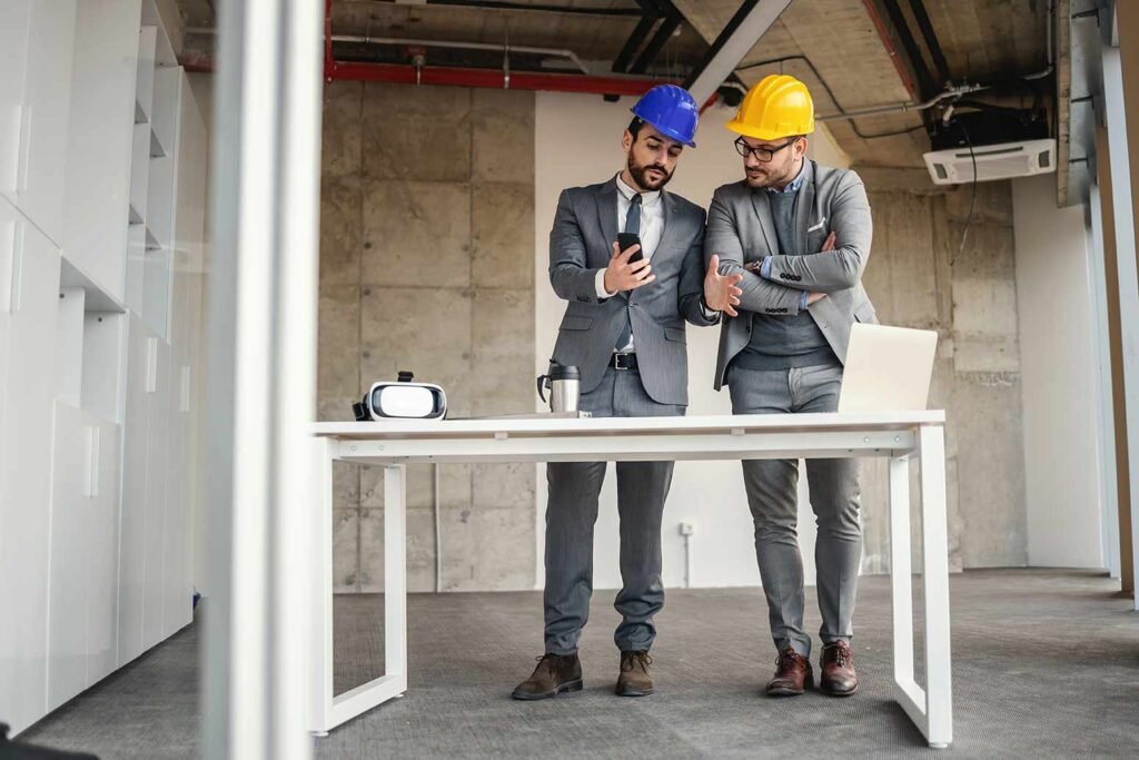 Client and contractor discussing home renovation options